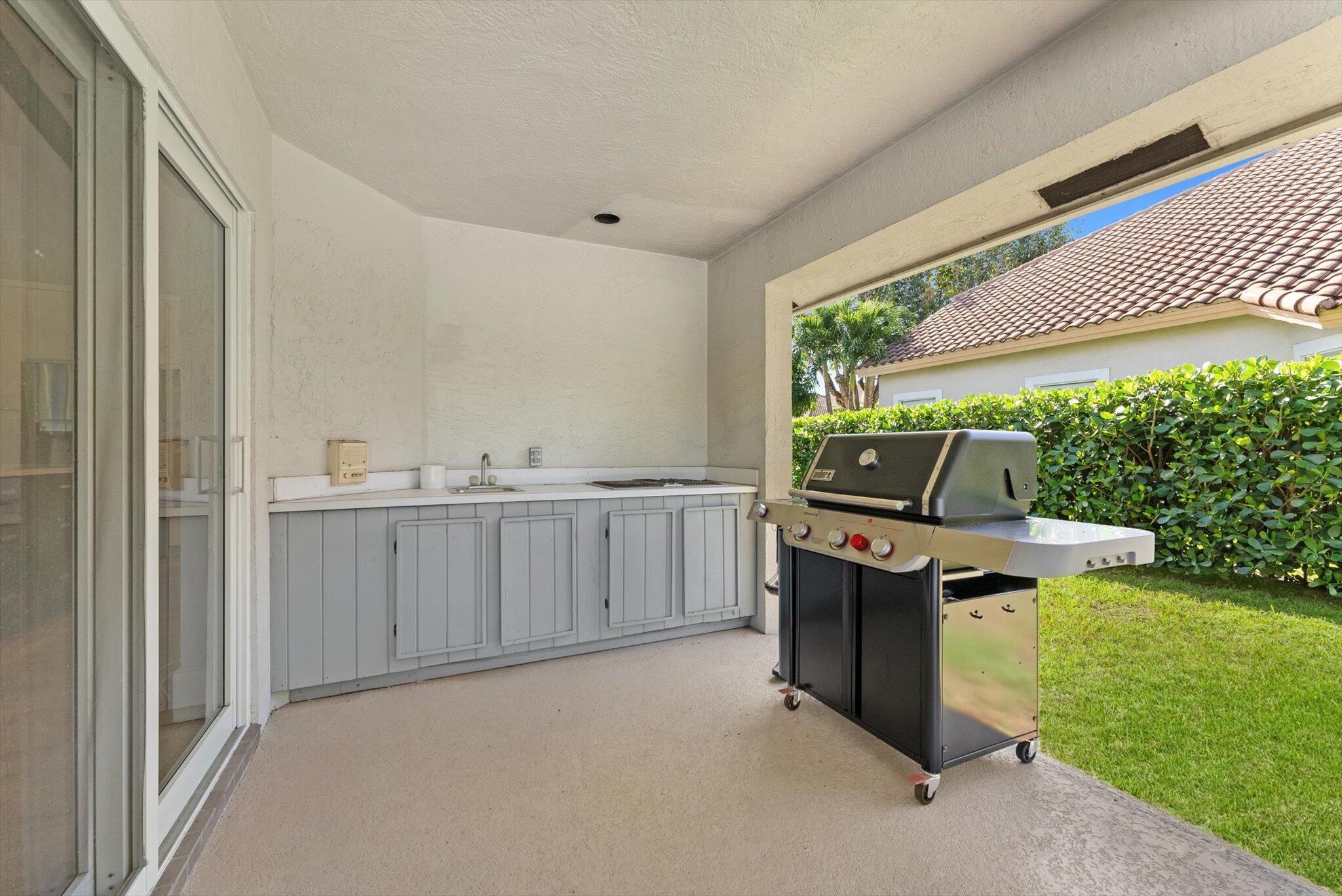 4429 Woodfield Boulevard Boca Raton, FL 33434 - Photo 38 of 61 patio