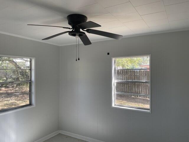 118 Peach Tree Street Paxton, FL 32567 - Photo 17 of 33 a view of an empty room with a window