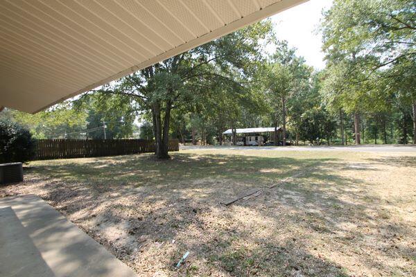 118 Peach Tree Street Paxton, FL 32567 - Photo 22 of 33 a view of street with trees