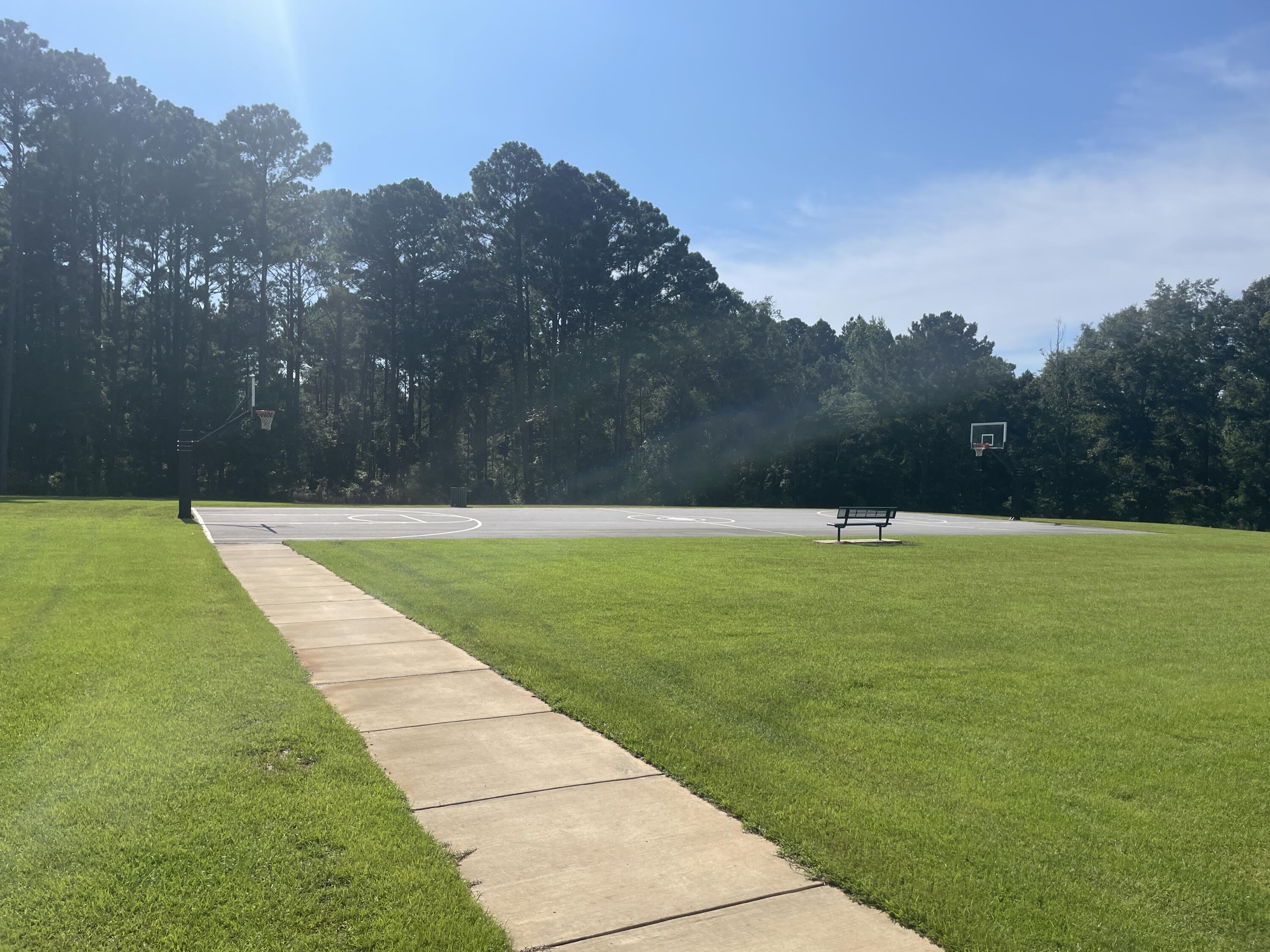 118 Peach Tree Street Paxton, FL 32567 - Photo 28 of 33 a view of a golf course with a park