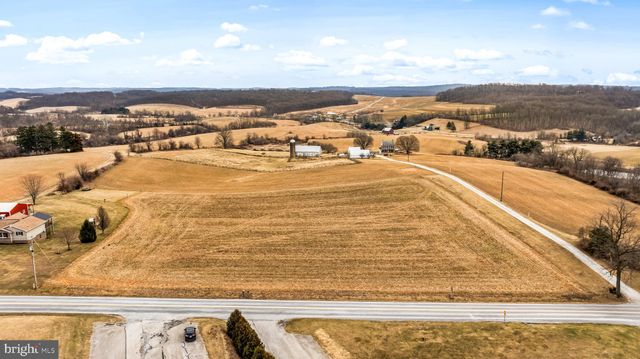 a view of an ocean with city