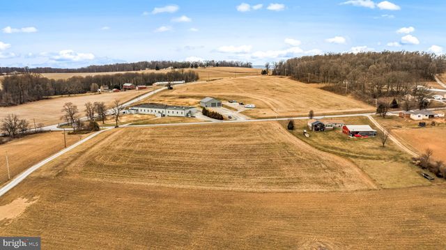 a view of an ocean and a mountain