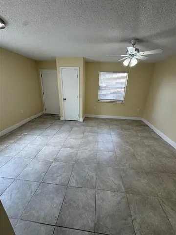 a kitchen with a sink and a stove