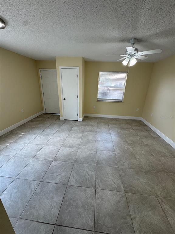 1179 Bentley Road, Unit 4 Leesburg, FL 34748 - Photo 4 of 10 a view of an empty room with a window