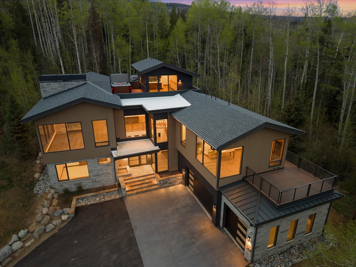 1615 Golden Eagle Road Silverthorne, CO 80498 - Photo 3 of 47 a view of a wooden bench on the roof deck