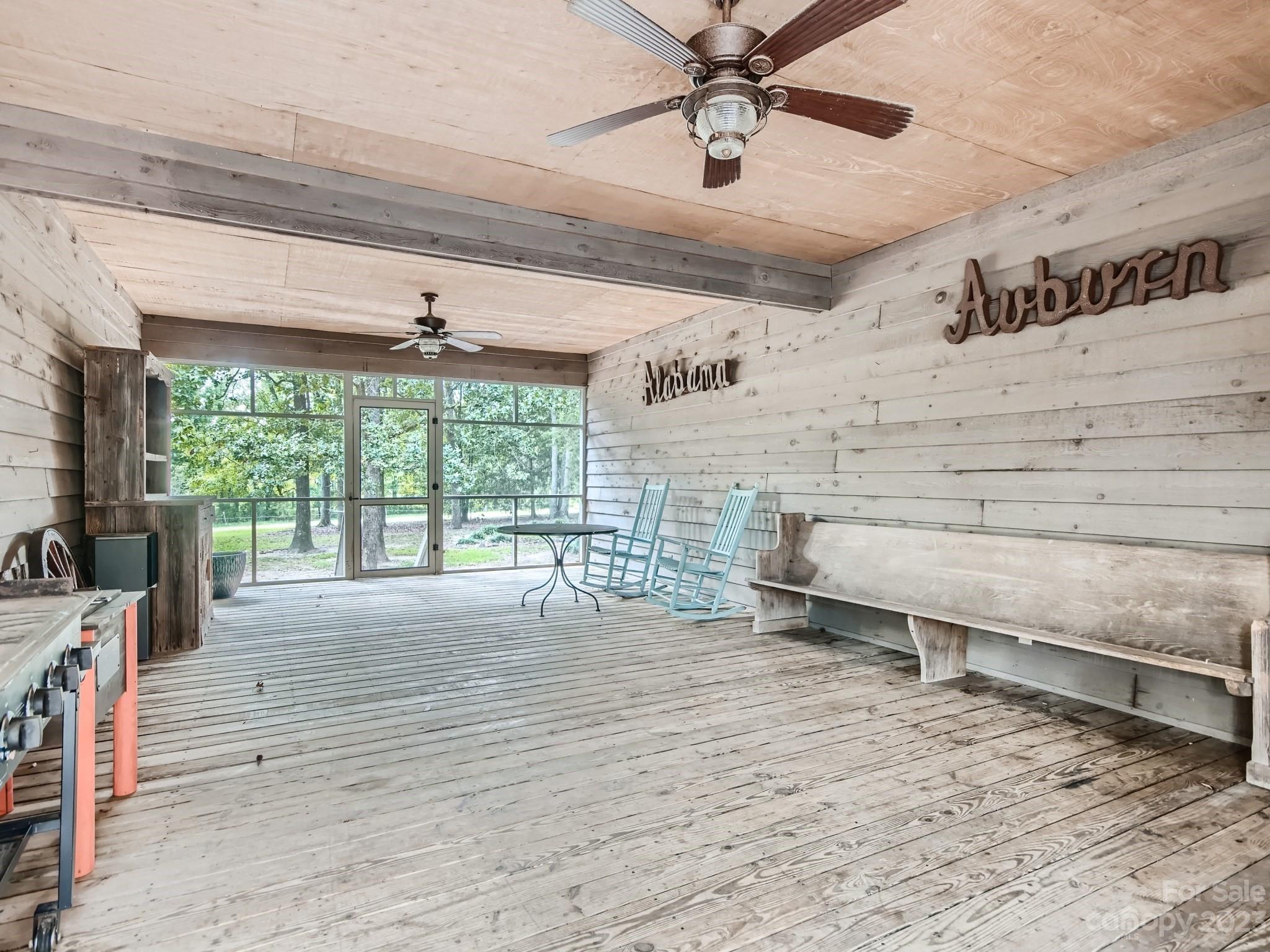 1815 Rock Rest Road Wingate, NC 28174 - Photo 23 of 27 workspace with wooden floor and windows