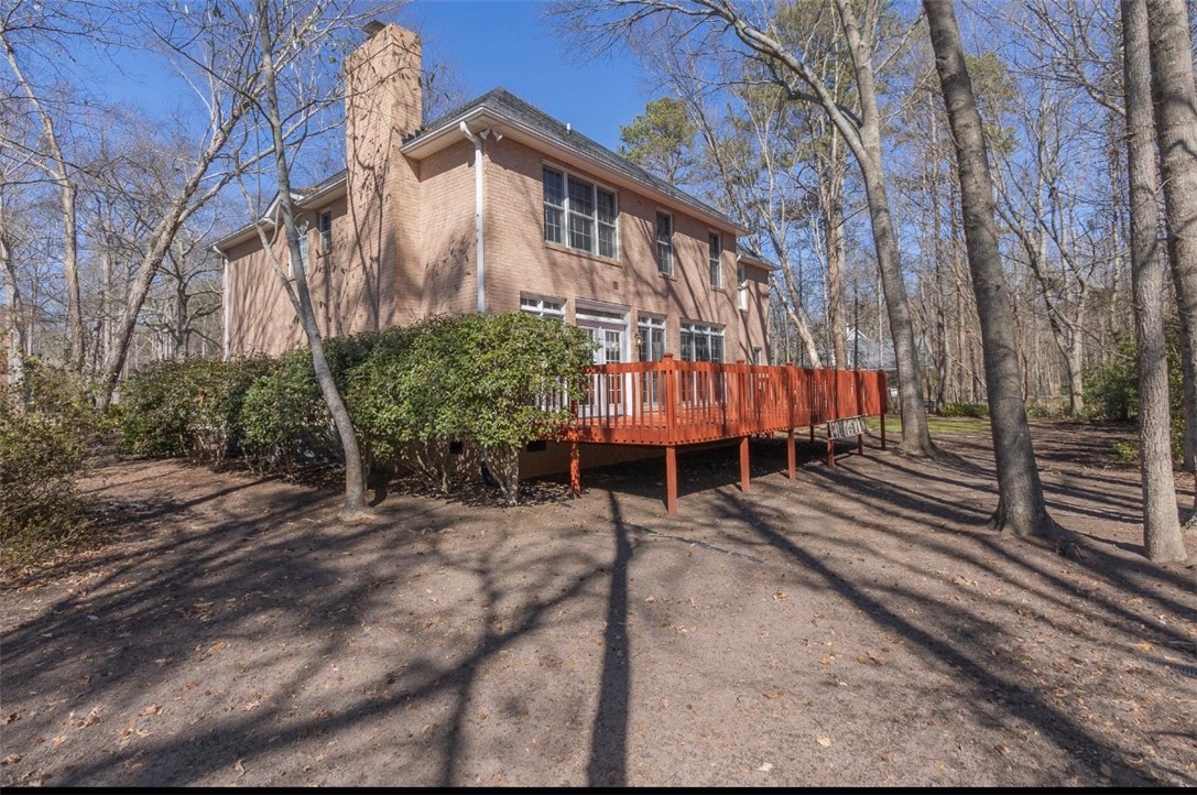 1104 Thornehill Drive Anderson, SC 29621 - Photo 7 of 35 This residence features a spacious deck, perfect for outdoor entertaining amidst a natural setting.