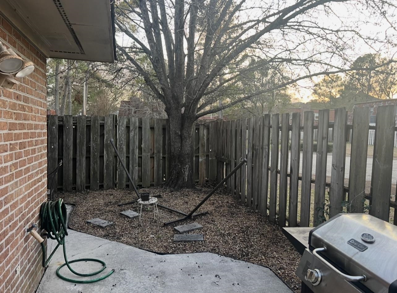 1025 Carolina Road, Unit O1 Conway, SC 29526 - Photo 14 of 18 Fenced backyard featuring area for grilling and a patio