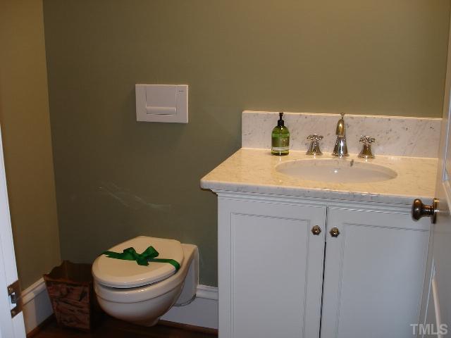 5326 Landguard Drive Raleigh, NC 27613 - Photo 10 of 17 a bathroom with a sink and a mirror