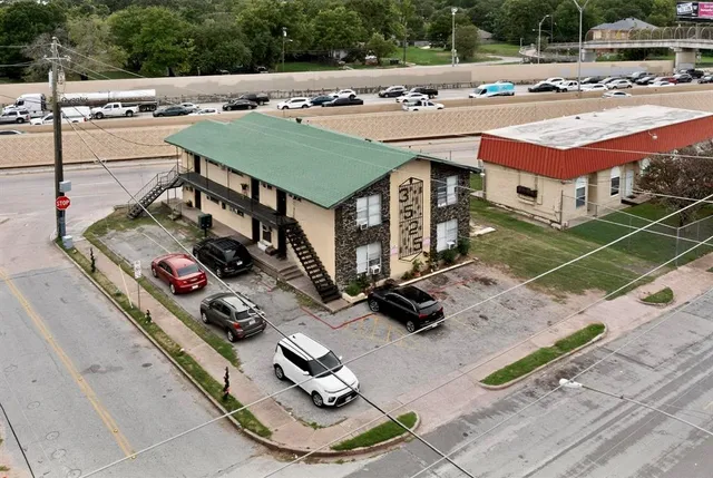 a front view of a house with parking space