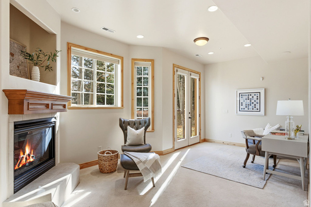 3026 Lower Saddleback Road Park City, UT 84098 - Photo 20 of 71 Carpeted home office featuring french doors, recessed lighting, and a glass covered fireplace