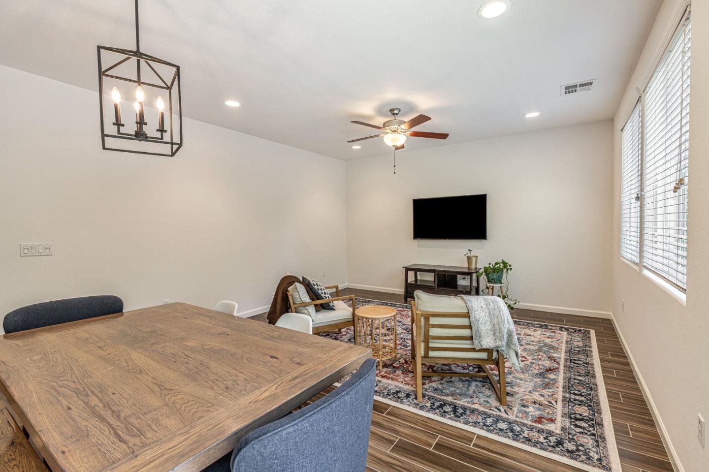 51 Koror Lane Gilroy, CA 95020 - Photo 12 of 50 a living room with furniture and a flat screen tv