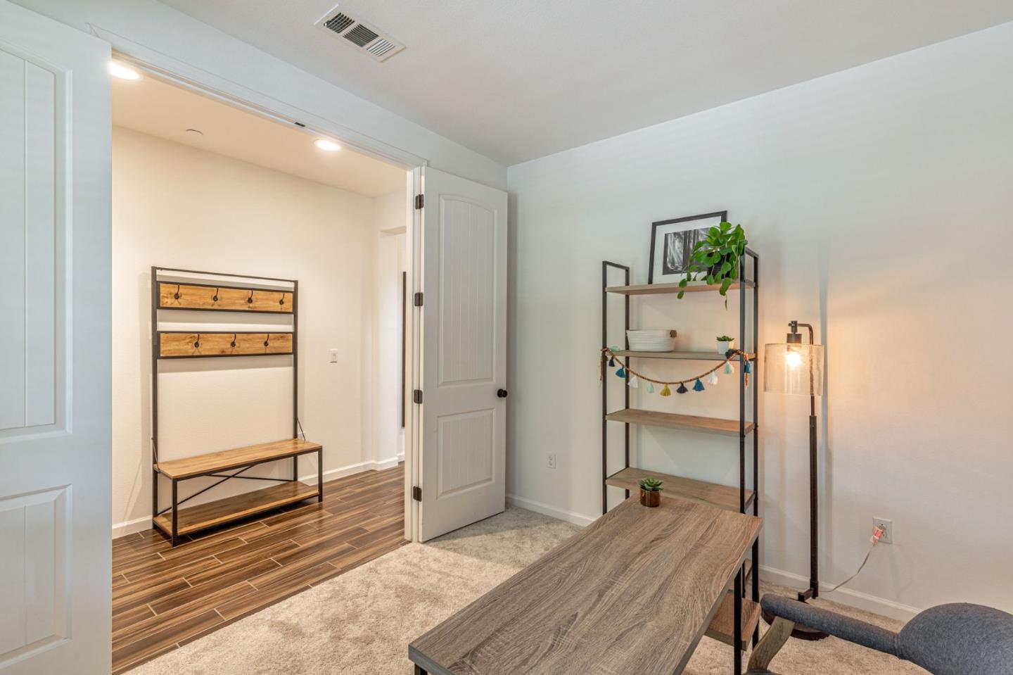 51 Koror Lane Gilroy, CA 95020 - Photo 14 of 50 a bedroom with a bed and a dresser