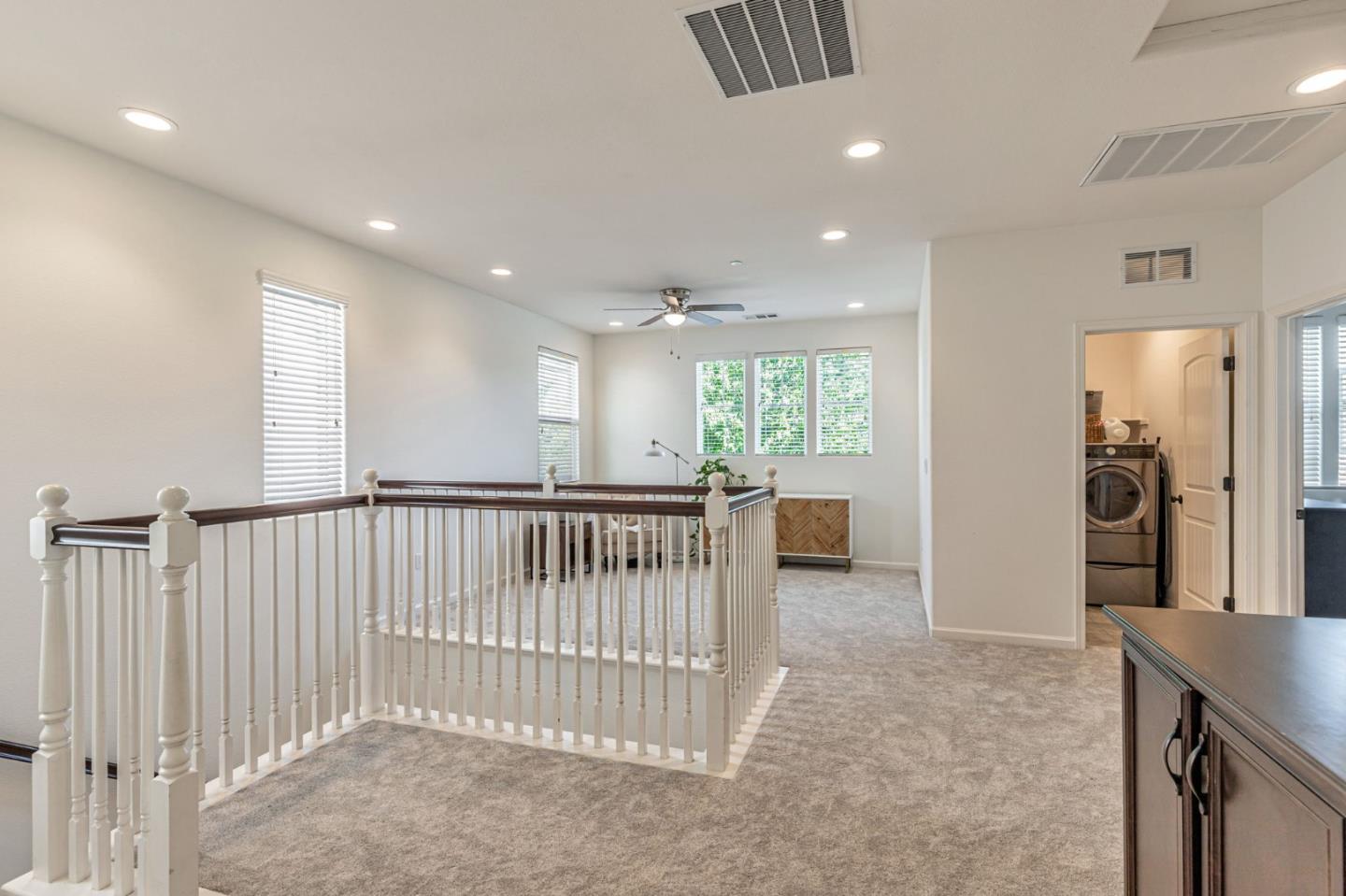 51 Koror Lane Gilroy, CA 95020 - Photo 16 of 50 a view of a hallway with windows