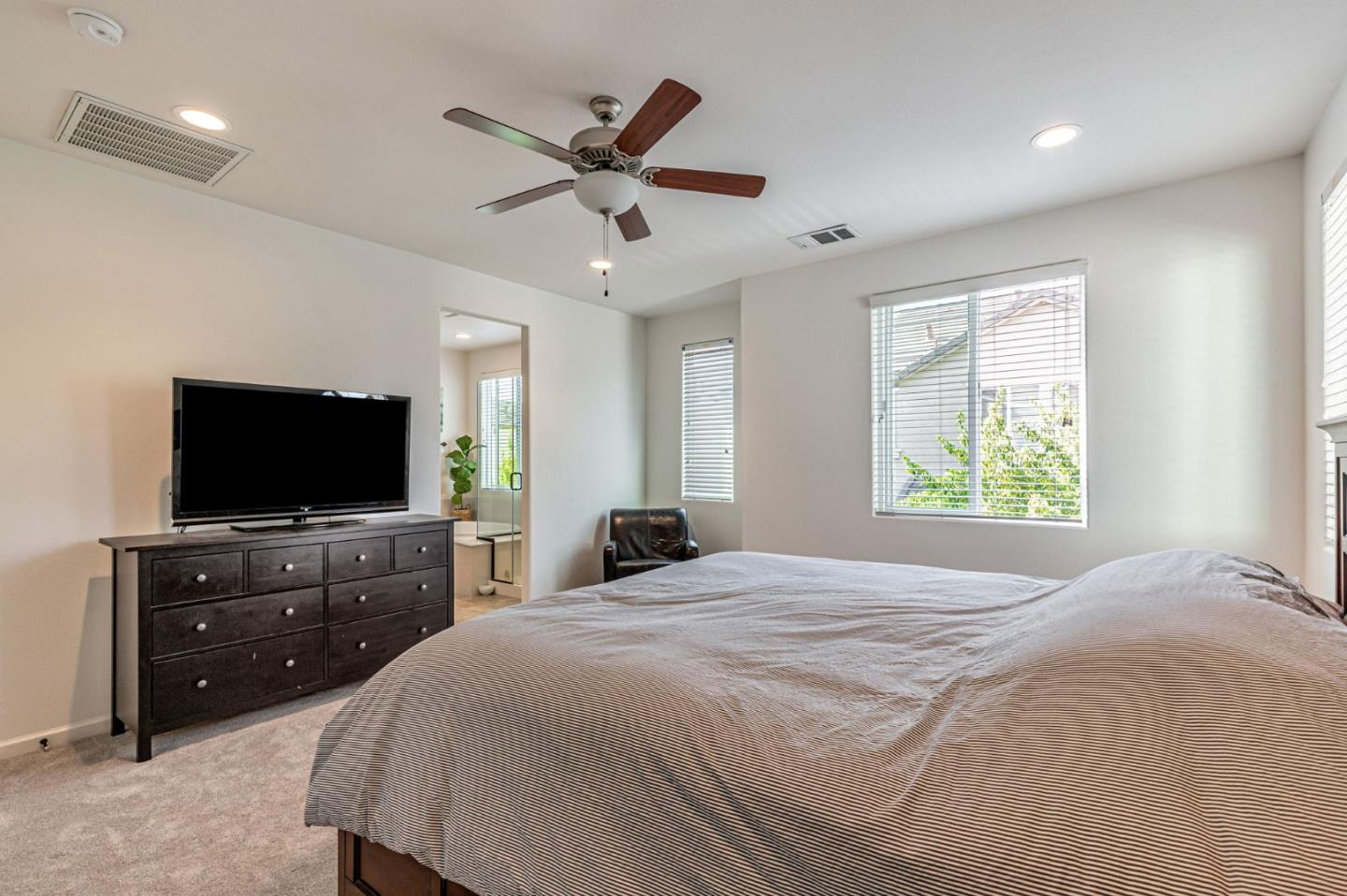 51 Koror Lane Gilroy, CA 95020 - Photo 20 of 50 a bedroom with a bed and a flat screen television