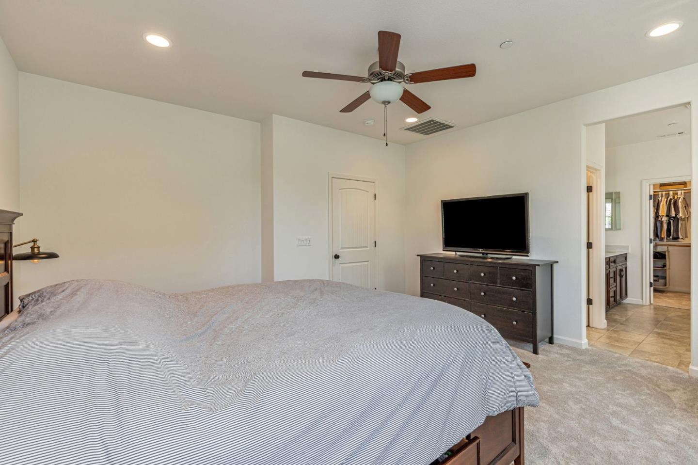 51 Koror Lane Gilroy, CA 95020 - Photo 21 of 50 a bedroom with a bed and a flat screen tv