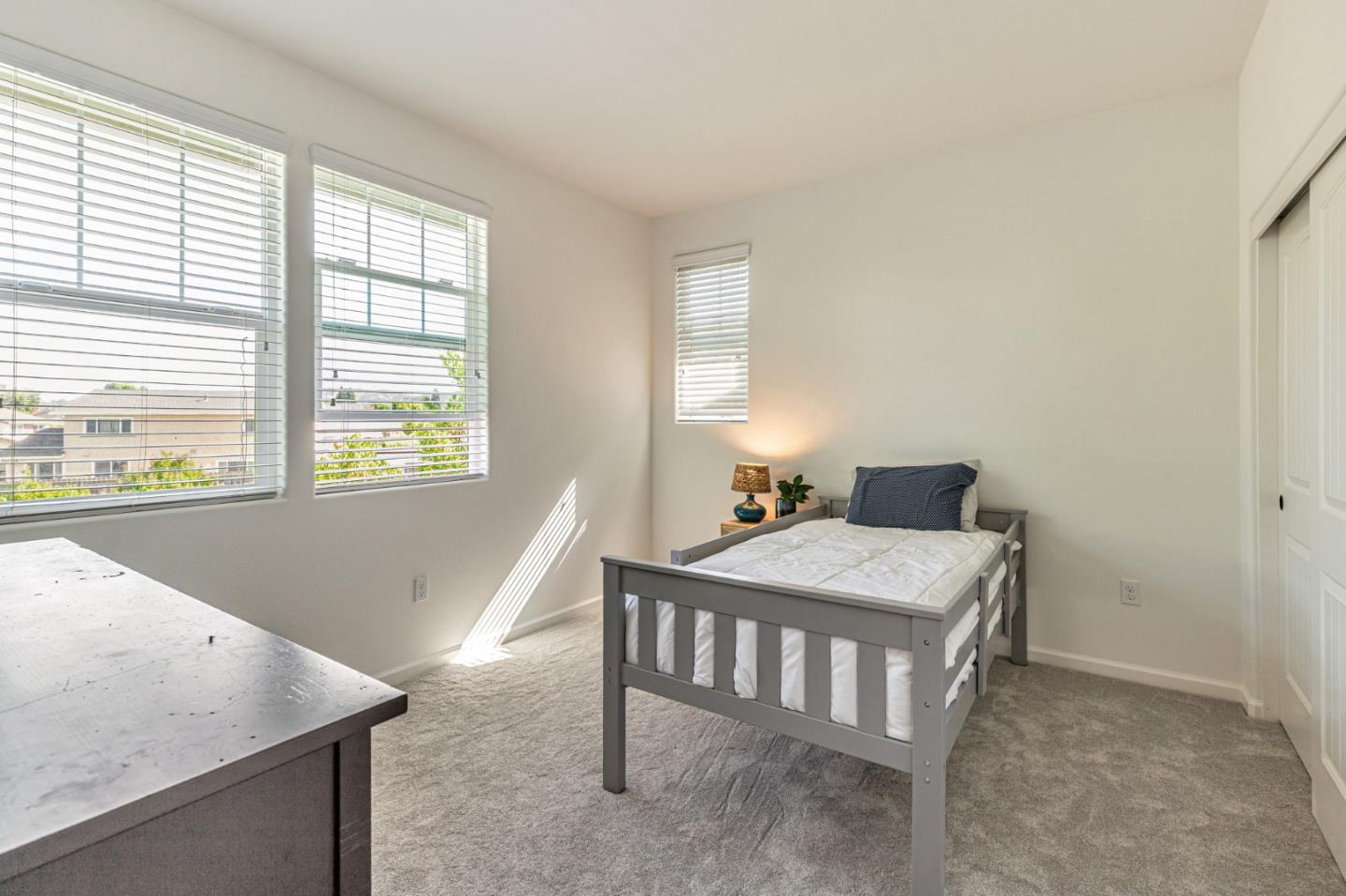 51 Koror Lane Gilroy, CA 95020 - Photo 25 of 50 a bedroom with a bed and a table