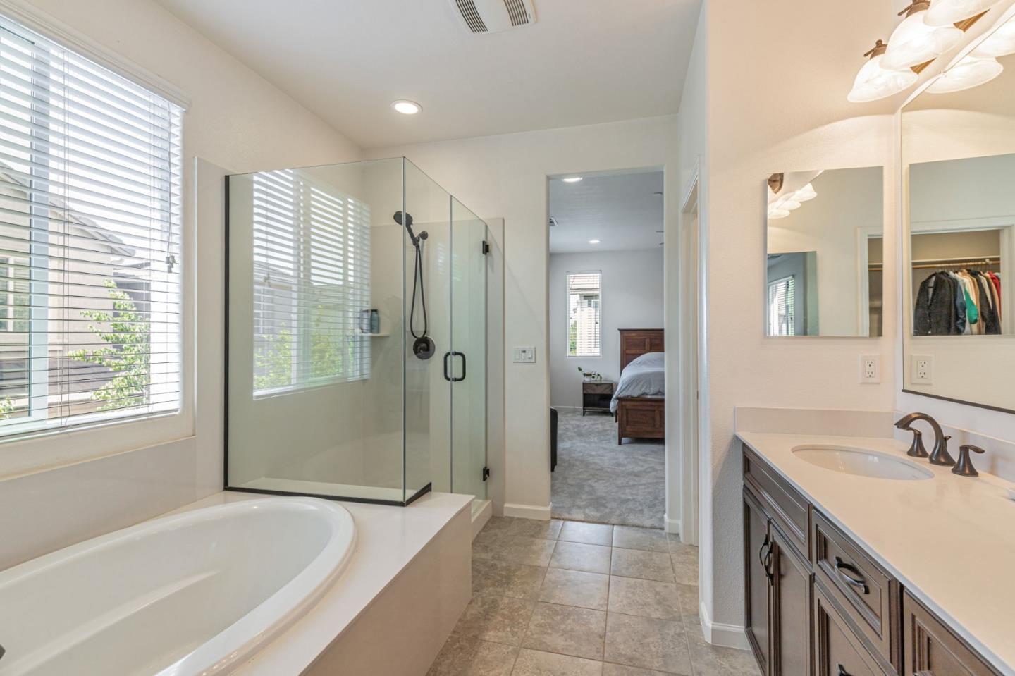 51 Koror Lane Gilroy, CA 95020 - Photo 32 of 50 a spacious bathroom with a tub shower and sink
