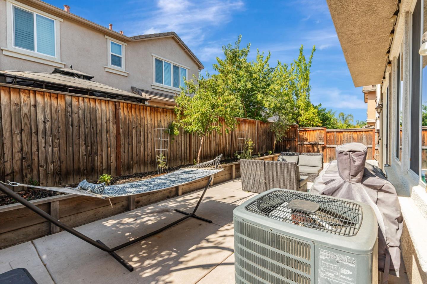 51 Koror Lane Gilroy, CA 95020 - Photo 39 of 50 a view of a couches and dinning table in patio