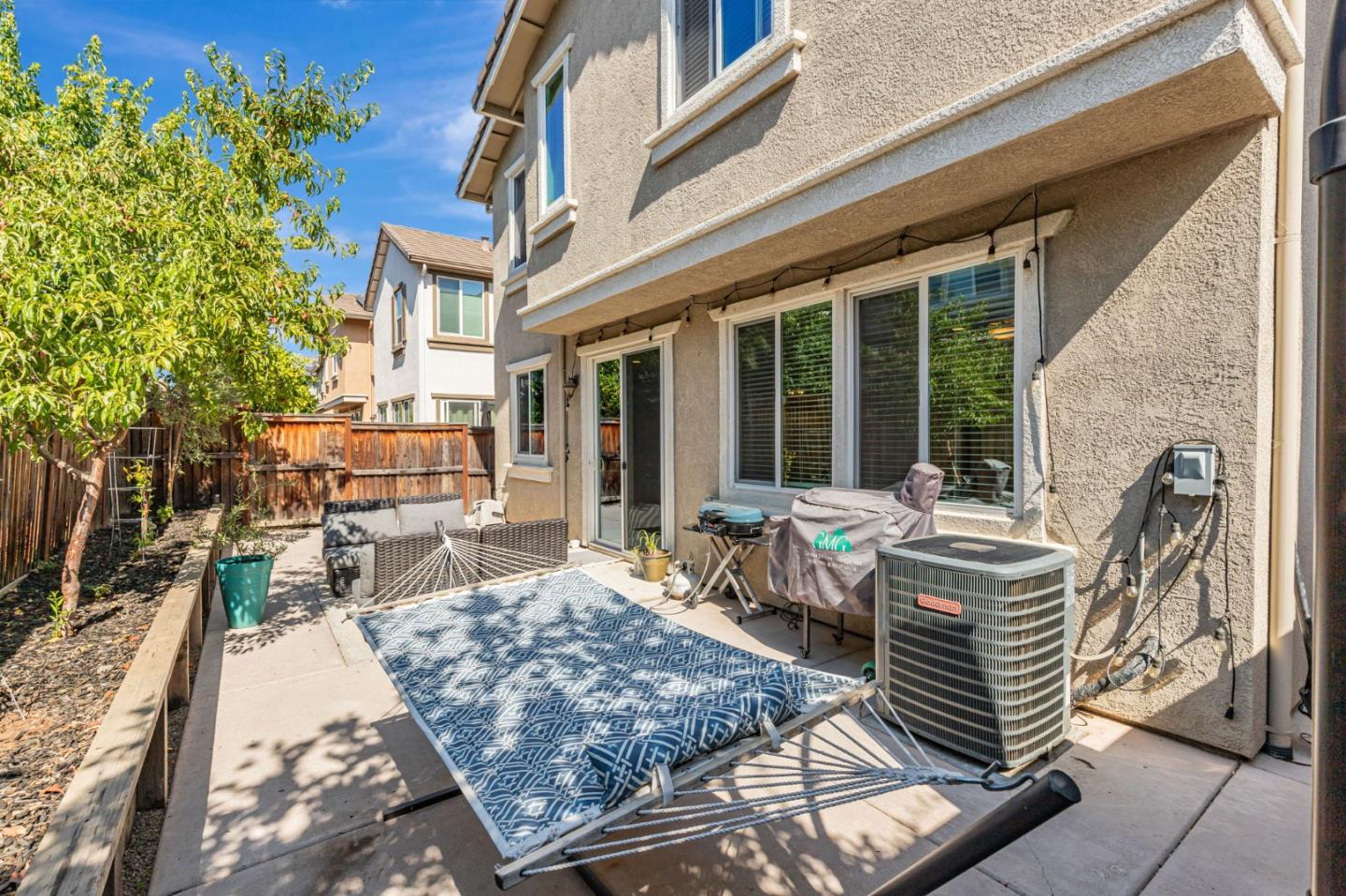 51 Koror Lane Gilroy, CA 95020 - Photo 40 of 50 a view of a house with backyard porch and sitting area