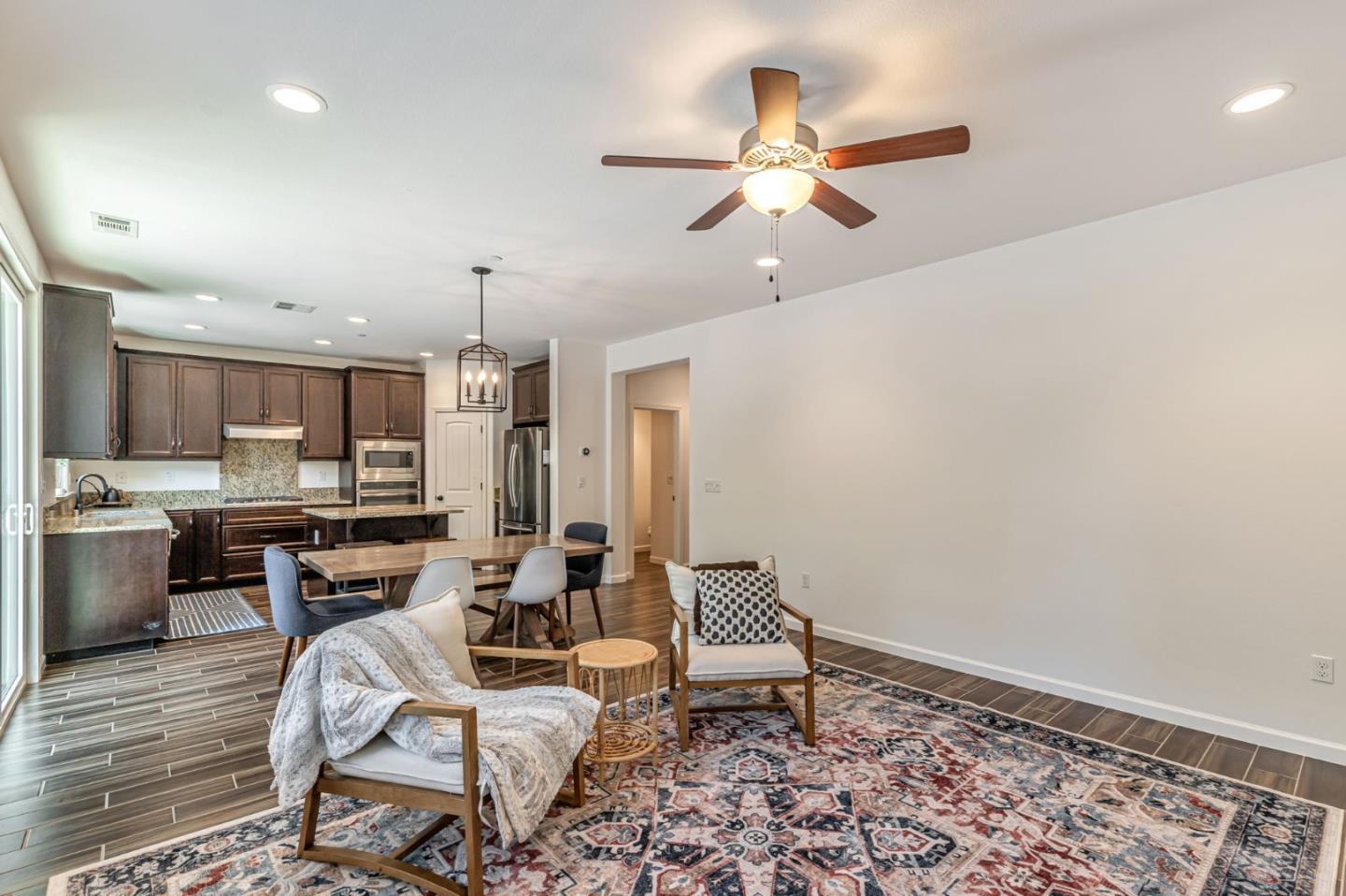51 Koror Lane Gilroy, CA 95020 - Photo 5 of 50 a living room with furniture and kitchen view