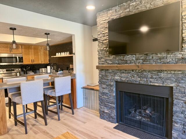 150 Ridgeview Street, Unit 221 Brian Head, UT 84719 - Photo 3 of 31 Remodeled fireplace