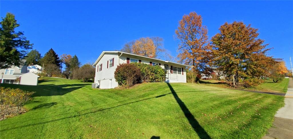 324 West Butler Street Mercer, PA 16137 - Photo 18 of 23 a view of a backyard with a house