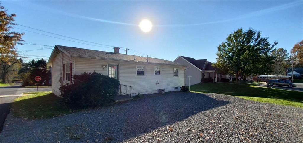 324 West Butler Street Mercer, PA 16137 - Photo 21 of 23 a view of a house with backyard and garden