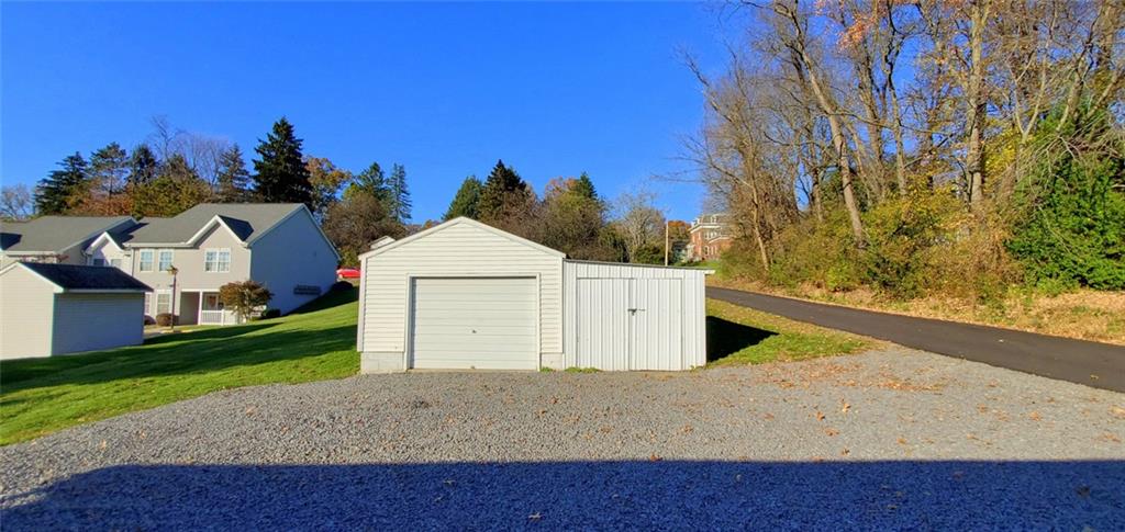 324 West Butler Street Mercer, PA 16137 - Photo 22 of 23 a view of a house with a yard