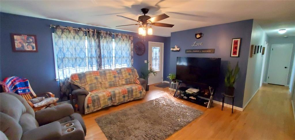 324 West Butler Street Mercer, PA 16137 - Photo 5 of 23 a living room with furniture and a flat screen tv