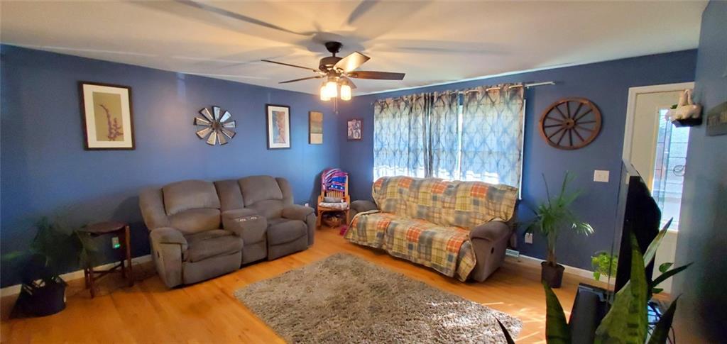 324 West Butler Street Mercer, PA 16137 - Photo 6 of 23 a living room with furniture and a flat screen tv