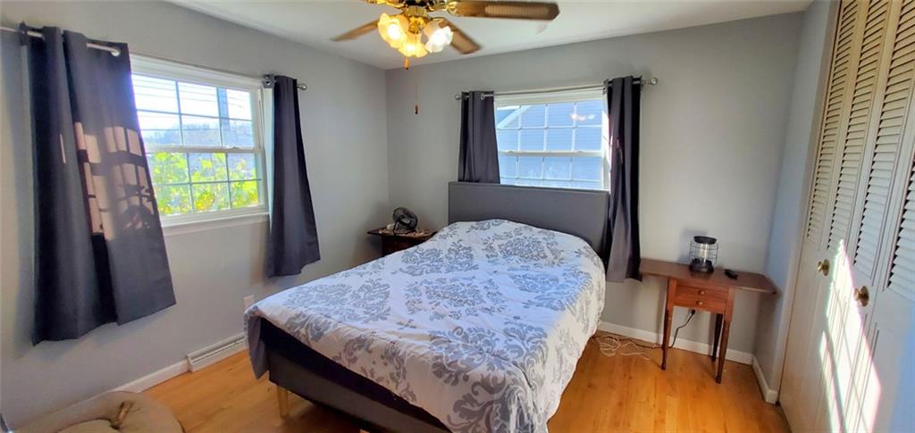 324 West Butler Street Mercer, PA 16137 - Photo 7 of 23 a bedroom with a bed and a window