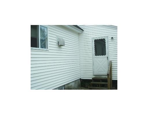 600 Shaker Road New Gloucester, ME 04260 - Photo 4 of 25 Exterior Back. Sunroom entry