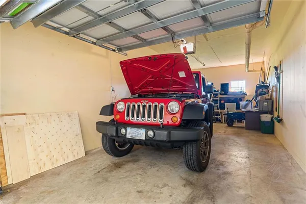 a view of a livingroom with wooden floor