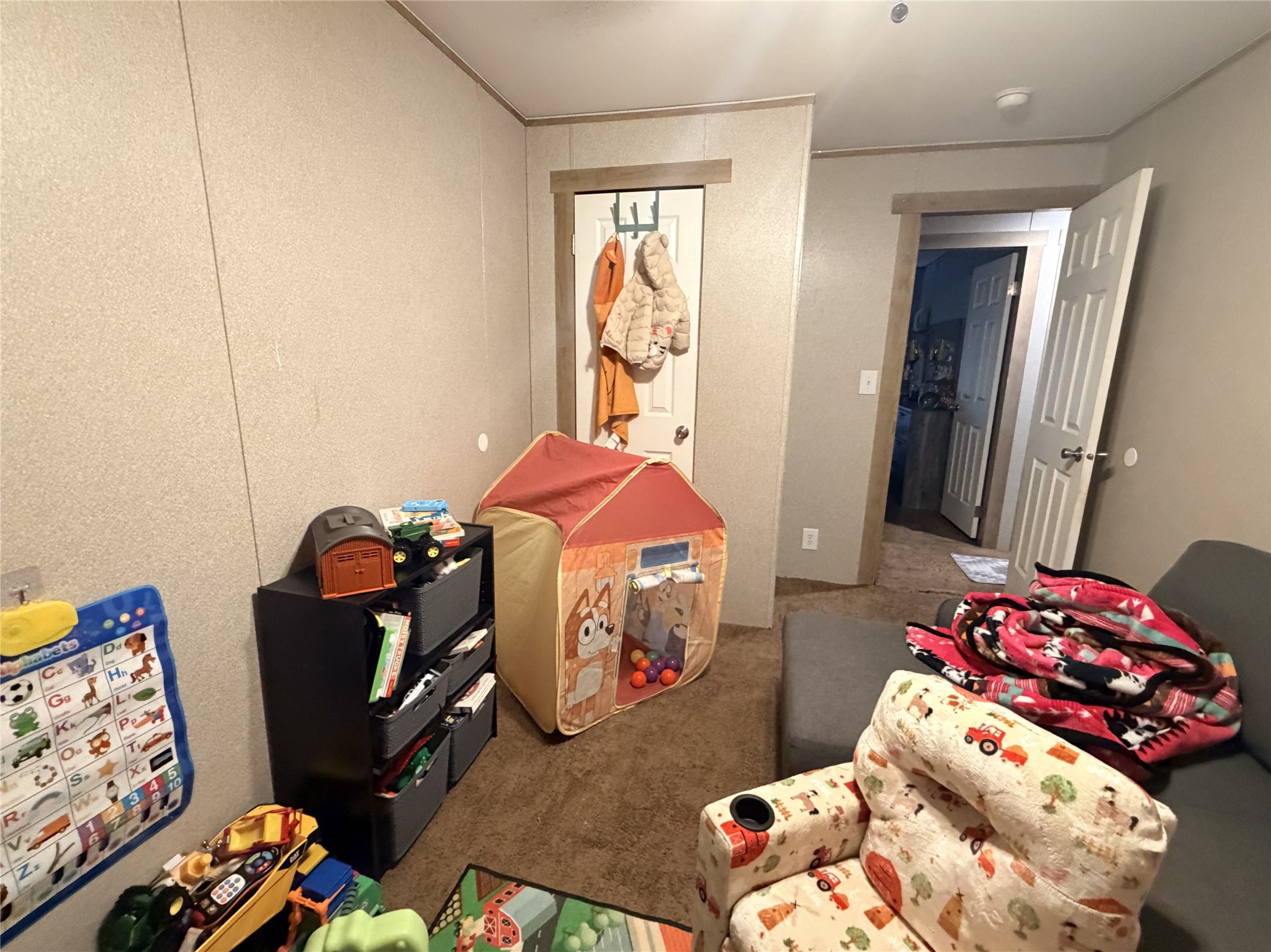 95 Westlake Road Trinity, TX 75862 - Photo 14 of 16 a bedroom with a bed and a window
