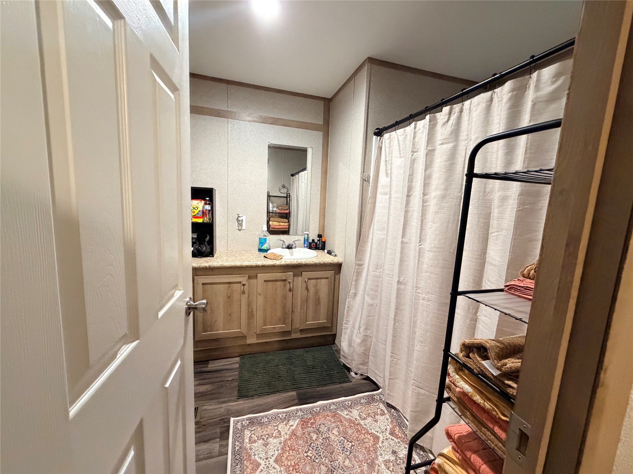 95 Westlake Road Trinity, TX 75862 - Photo 15 of 16 a bathroom with sink shower and mirror