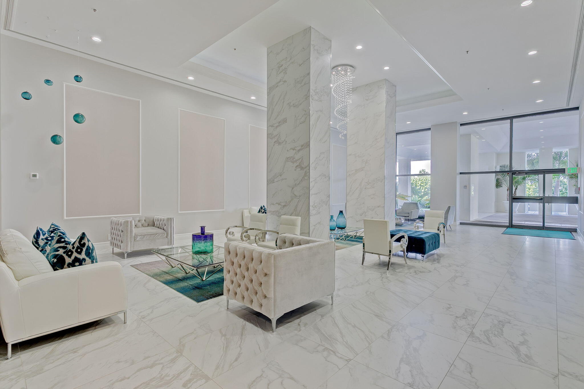 5280 North Ocean Drive, Unit 14D Riviera Beach, FL 33404 - Photo 41 of 55 a living room with furniture and large windows