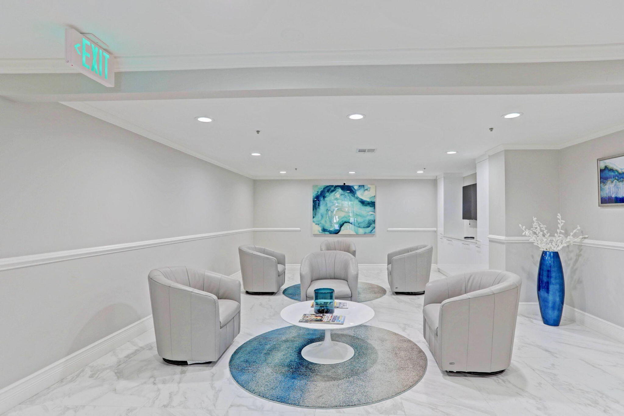 5280 North Ocean Drive, Unit 14D Riviera Beach, FL 33404 - Photo 42 of 55 a living room with furniture and a table