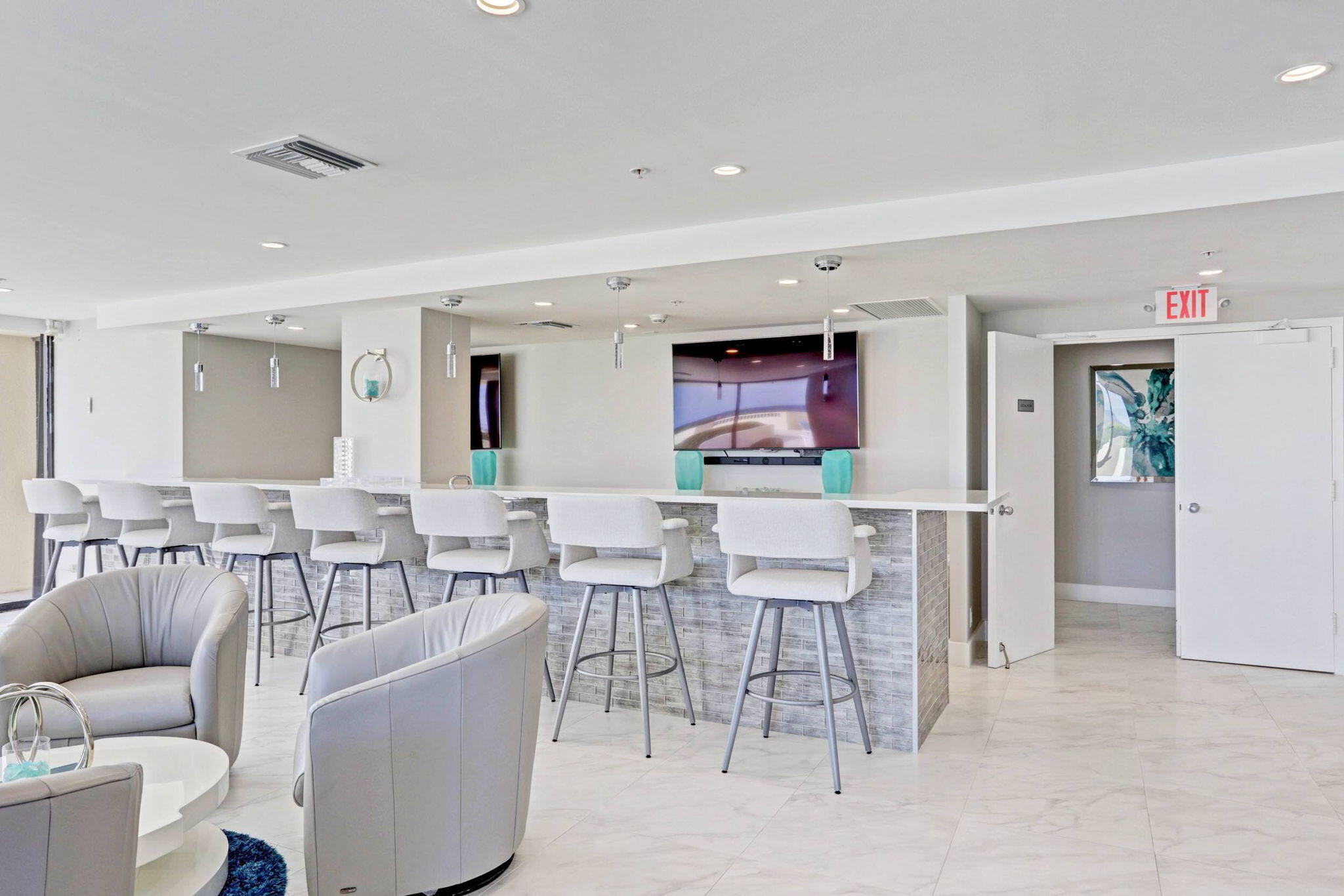 5280 North Ocean Drive, Unit 14D Riviera Beach, FL 33404 - Photo 43 of 55 a living room with furniture and a wooden floor
