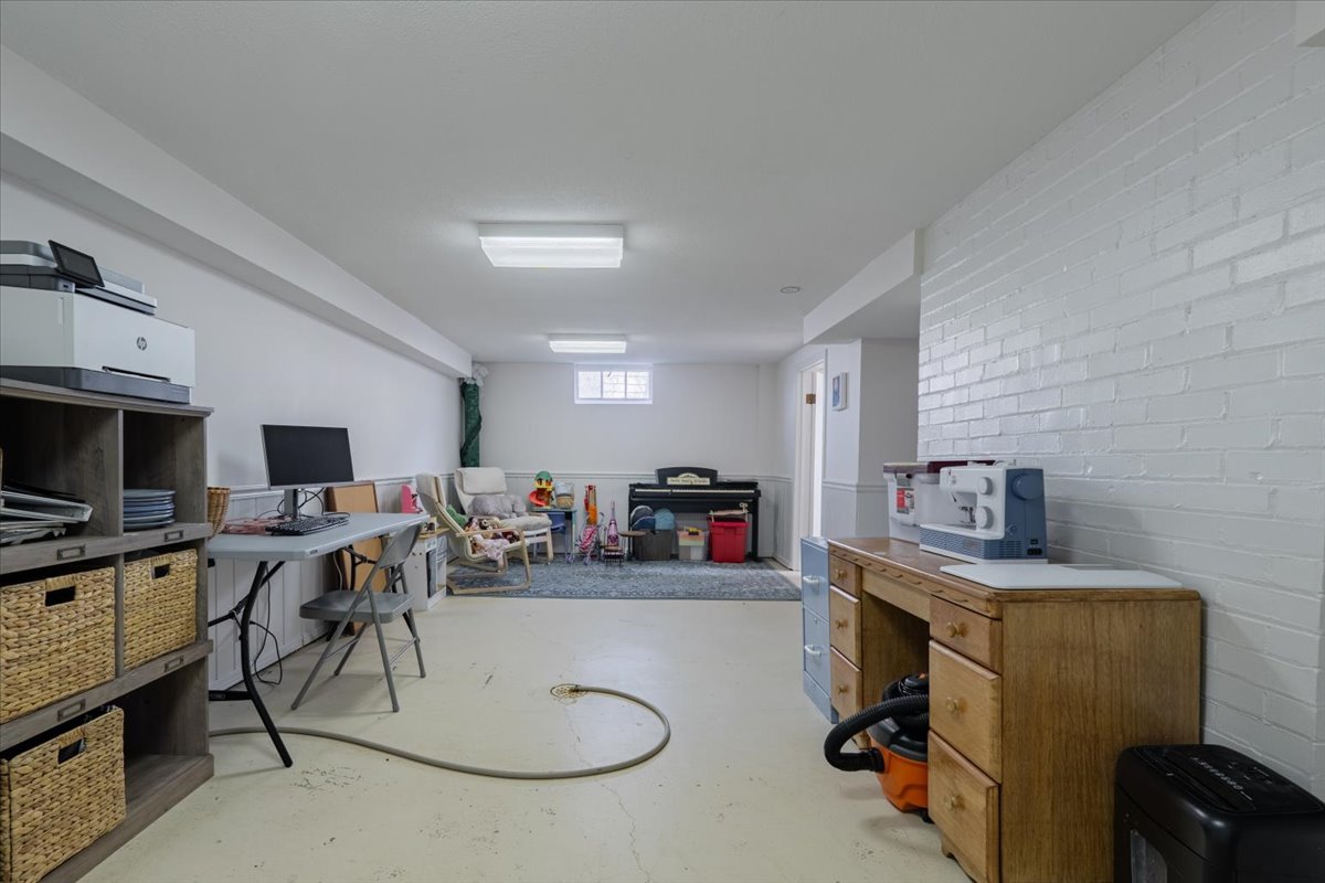 413 Grant Street Normal, IL 61761 - Photo 26 of 40 a view of a workspace with furniture