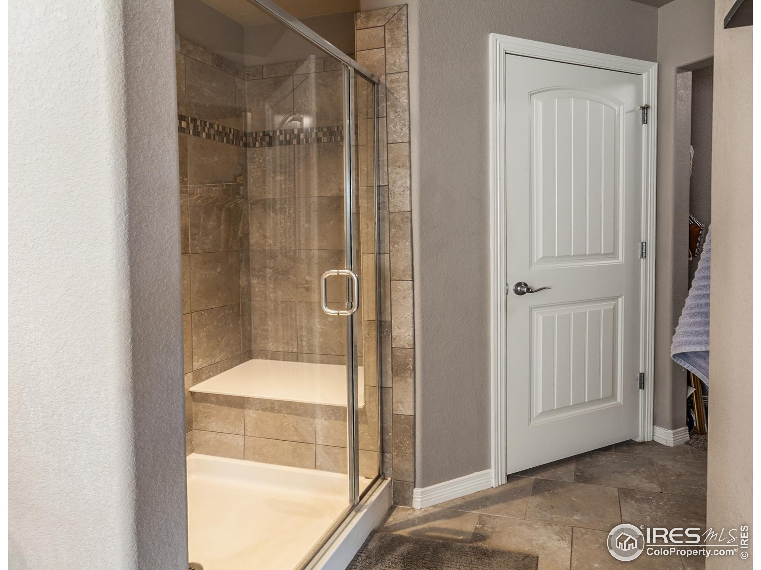 1297 Wild Basin Road Severance, CO 80550 - Photo 24 of 44 a bathroom with a tub