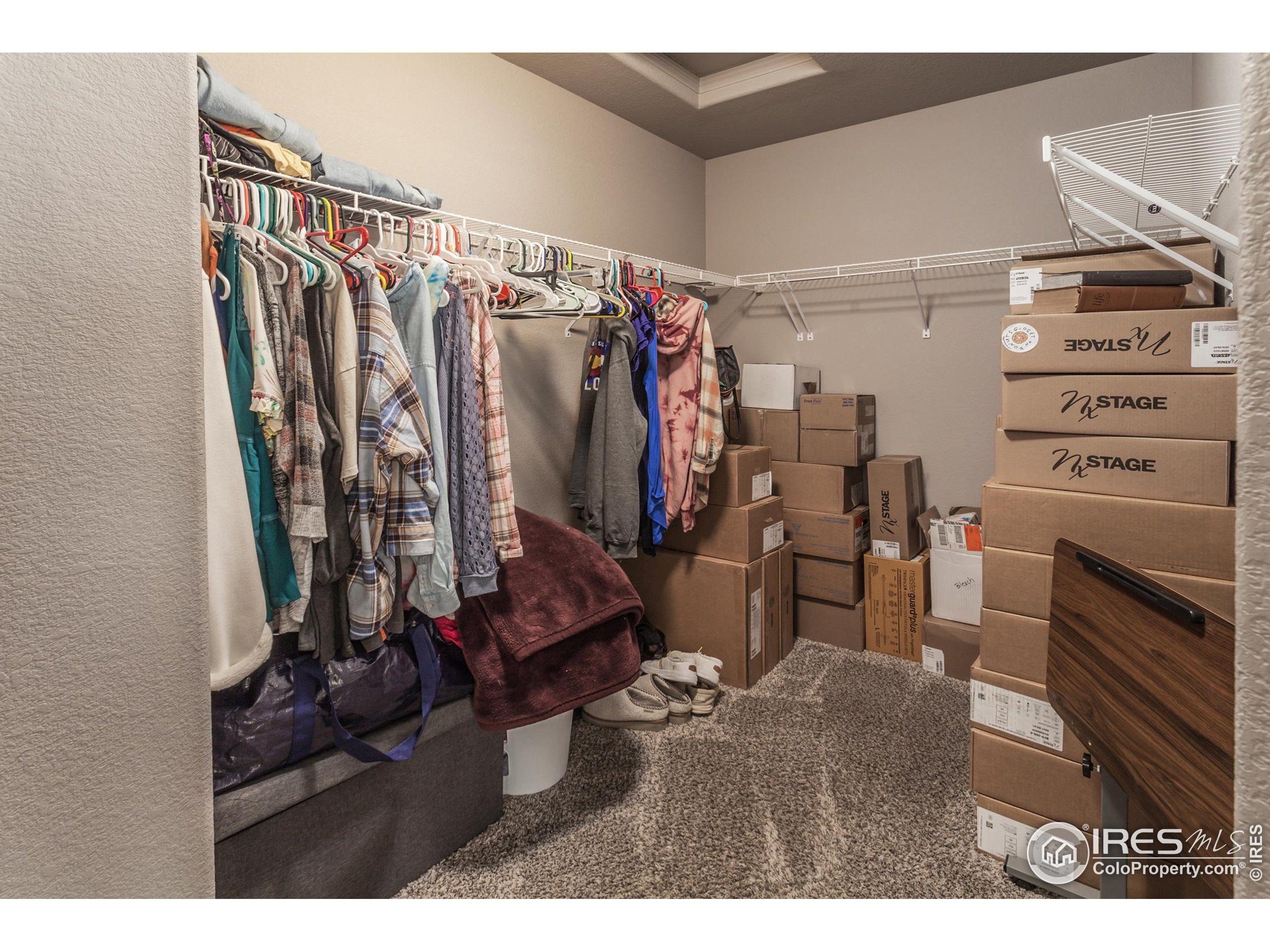 1297 Wild Basin Road Severance, CO 80550 - Photo 25 of 44 a view of a closet with storage