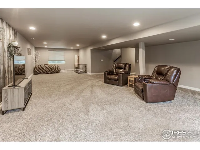 a large room with lots of chairs and a projector