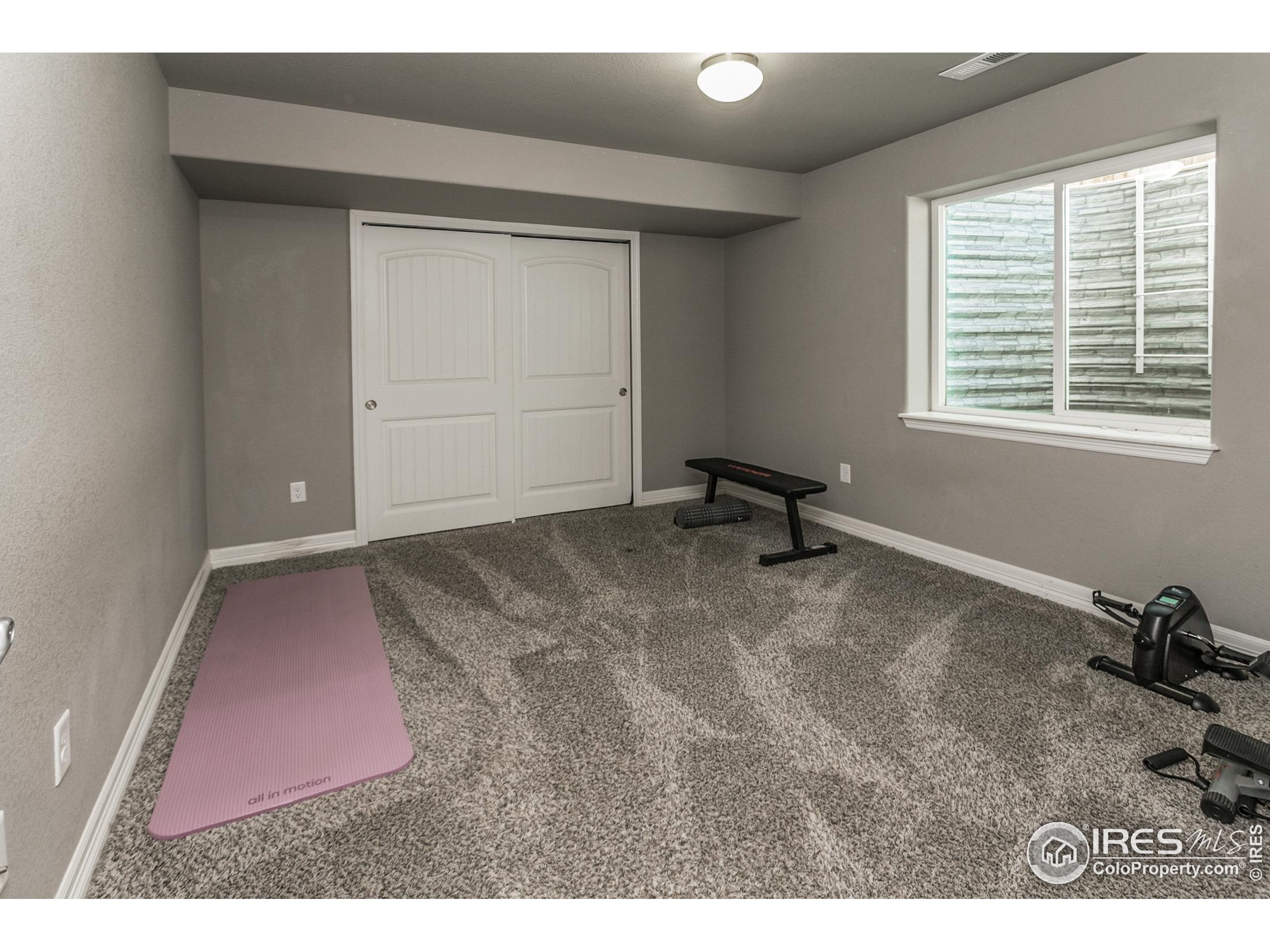 1297 Wild Basin Road Severance, CO 80550 - Photo 32 of 44 a view of room with hardwood