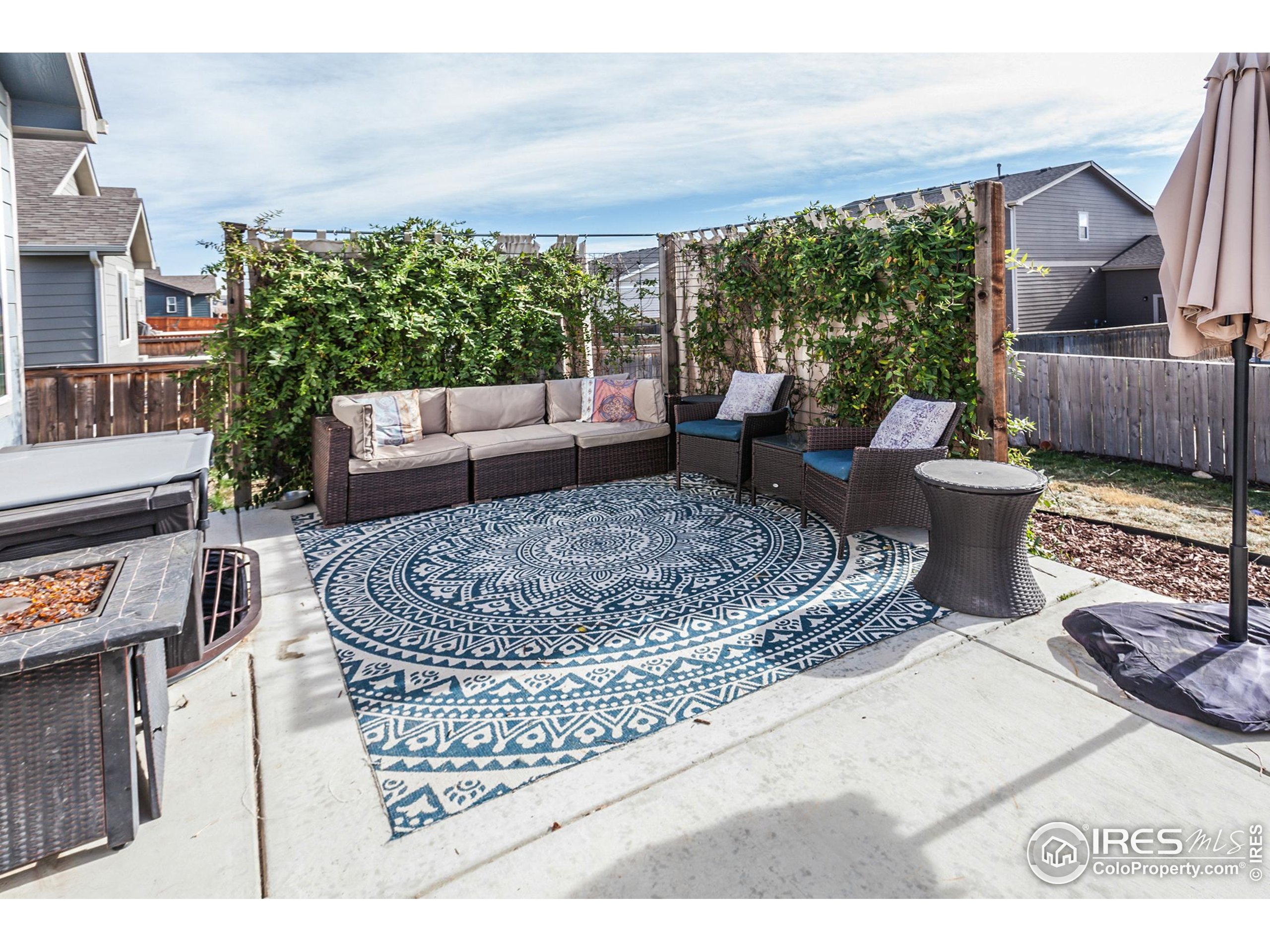 1297 Wild Basin Road Severance, CO 80550 - Photo 37 of 44 a living room with furniture and a large window