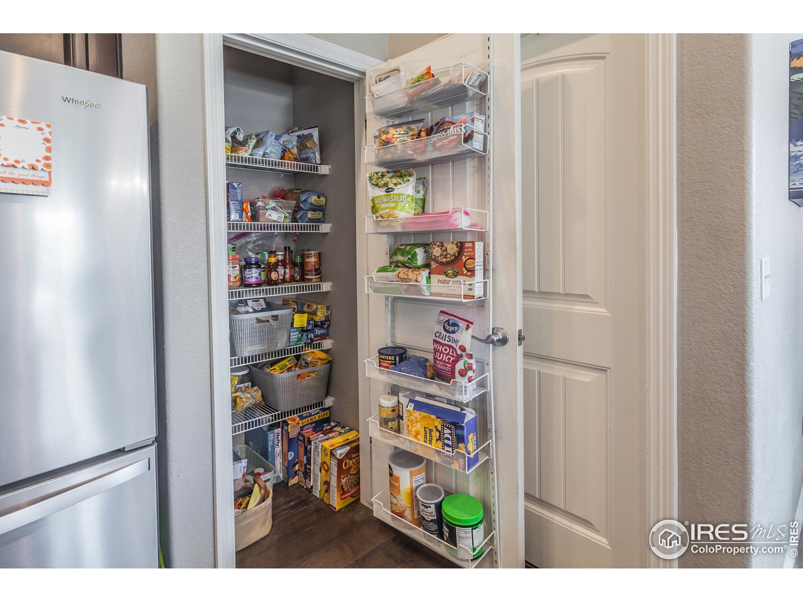 1297 Wild Basin Road Severance, CO 80550 - Photo 10 of 44 a utility room with dryer and washer