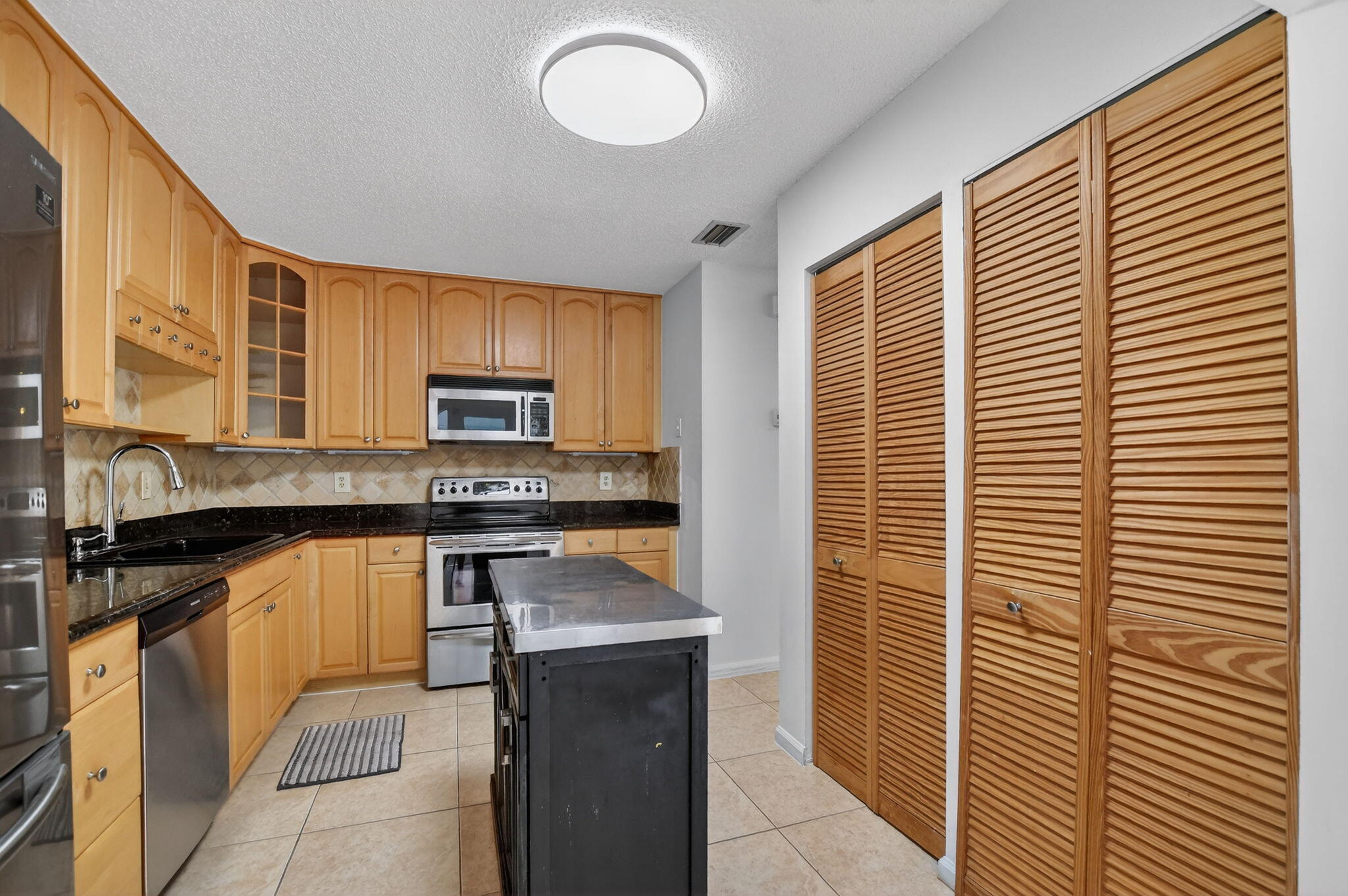 6671 Via Regina, Unit 6671 Boca Raton, FL 33433 - Photo 14 of 49 Kitchen
