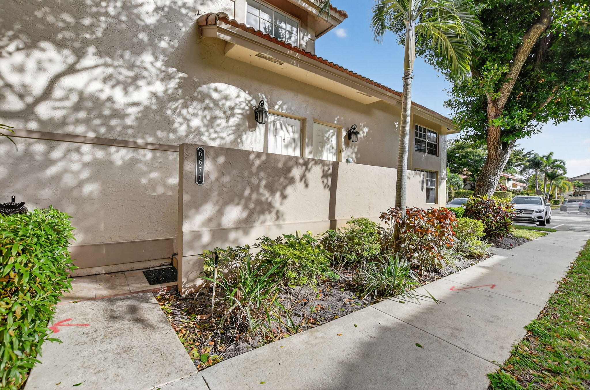 6671 Via Regina, Unit 6671 Boca Raton, FL 33433 - Photo 2 of 49 Front