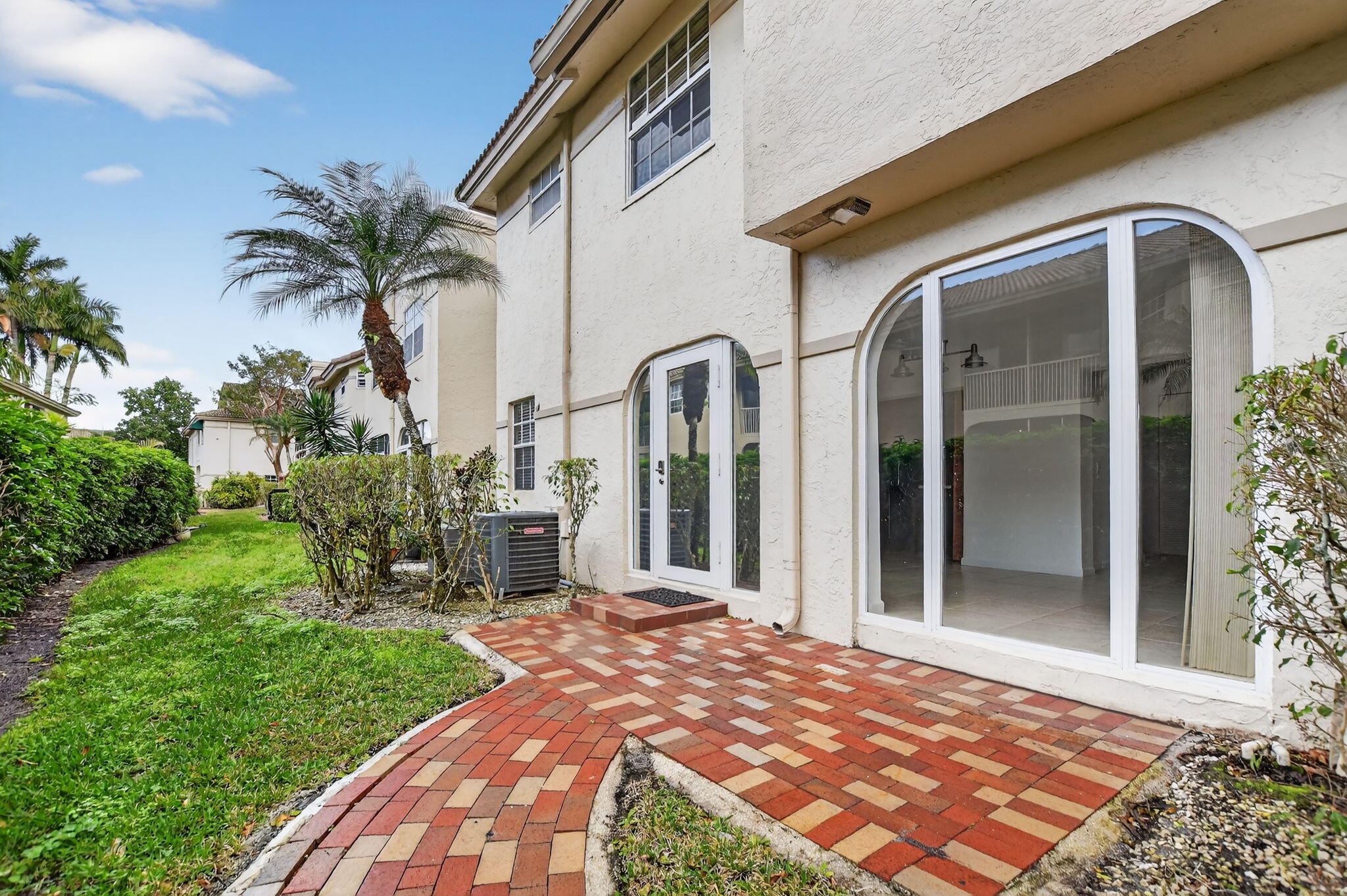 6671 Via Regina, Unit 6671 Boca Raton, FL 33433 - Photo 37 of 49 outdoor back patio open