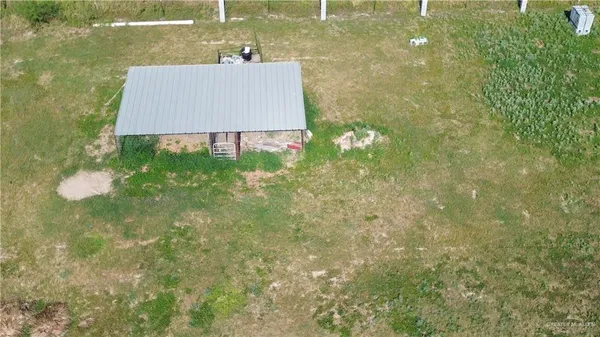 a sign that is sitting in front of a bathroom